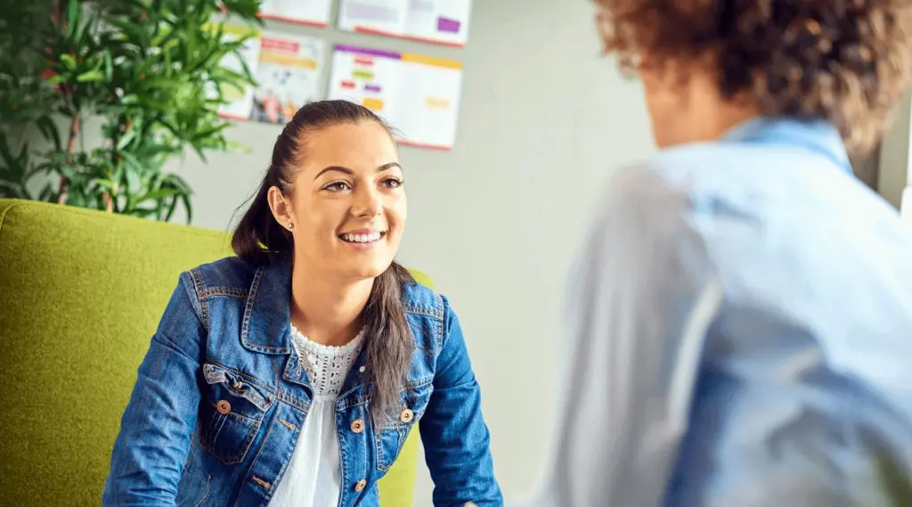 Girl in meeting talking